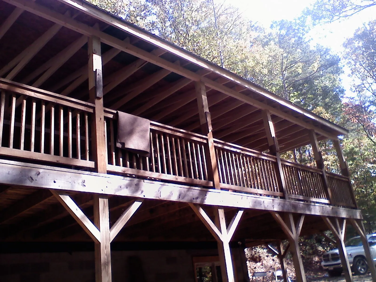Timber framing under a new elevated porch and deck — Roof Leak Repair in Anahuac by Roofing Brothers
